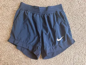 Nike Women’s Flex 4” Essential Shorts  thumbnail 1