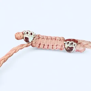 Heart You Back pink dog bone bracelet with silver bones and paws thumbnail 3