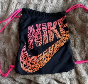 Nike Drawstring Bag Black, Pink, and Orange  thumbnail 1