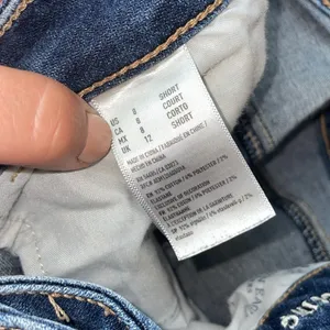 American Eagle outfitters super stretch X jeans high rise jeggings 8 distressed​ thumbnail 9