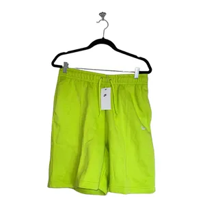 NWT NIKE WOMEN'S ESSENTIAL FLEECE SHORT ATOMIC GREEN Medium Pull On thumbnail 7