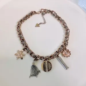 𝅺GUESS Charm Necklace Flower Tassel Bar thumbnail 1