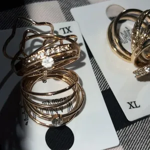 Two sets of stackable goldtone rings size 9 Gold thumbnail 8