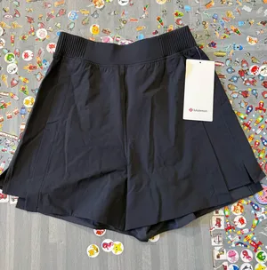 Lululemon women’s stretch woven relaxed fit hr shorts 4” thumbnail 1