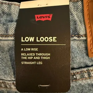 Levi’s Low Loose in medium wash jeans . Size 29 NWT (Sold at Free People) thumbnail 3