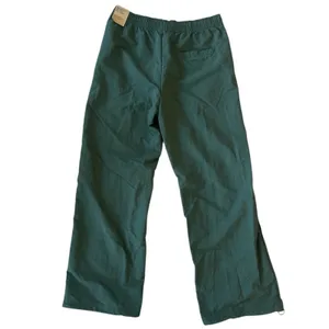 Nike Sportswear Everything Wovens Trackpants Vintage Green/Sail Size Medium NWT thumbnail 4