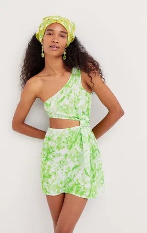 For Love & Lemons Devon Mini Dress in a vibrant green and white tie-dye print thumbnail 1