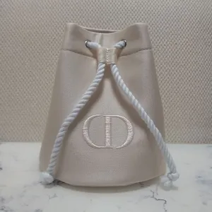 Dior Cream Drawstring Bucket Trousse Pouch Cosmetic Bag thumbnail 1