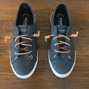 Women’s Sperry Navy Blue Canvas Sneakers thumbnail 1