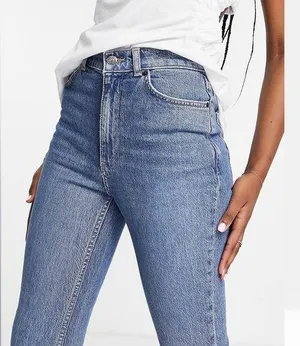ASOS DESIGN high rise '70's' stretch flare jeans in midwash thumbnail 1