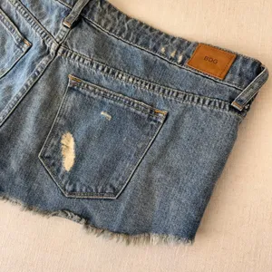 BDG Urban Outfitters Low Rise y2k Dolphin Denim Shorts Blue Distressed Women 32W thumbnail 7