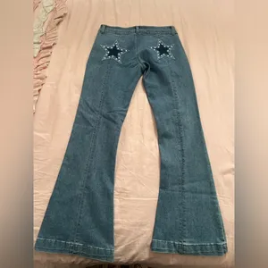 COPY - Forever 21 star flared jeans thumbnail 1