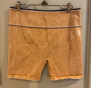 FREE PEOPLE Movement M/L Biker Varsity Tipping Biker Compression Shorts Orange thumbnail 1