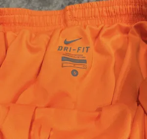 Nike DriFIT Athletic Orange Dash Running Shorts thumbnail 7
