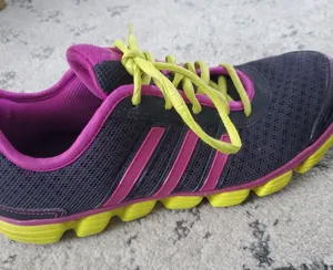 Adidas athletic shoes size 9 in purple and green . Very lightweight and … thumbnail 1