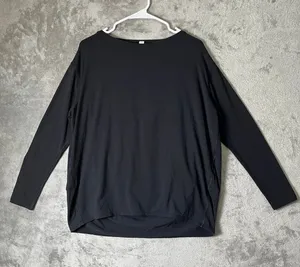 Lululemon Back In Action Long Sleeve Black Relaxed Athleisure Top Size 8 thumbnail 1