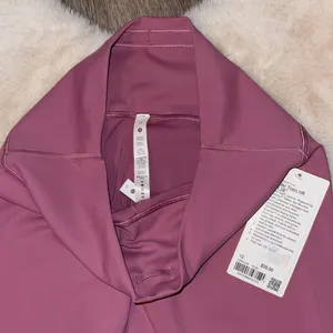 Lululemon Wunder Train HR Tight 28” Size 12 thumbnail 12