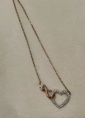 Swarovski Rose gold and silver infinity heart necklace thumbnail 1
