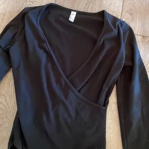Stunning Black Long Sleeve Low Cut American Apparel Bodysuit thumbnail 2