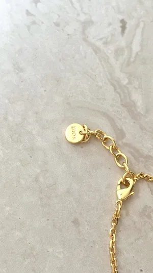 Christian Dior Crystal & Resin Pearl Petit CD Charm Gold Bracelet thumbnail 4