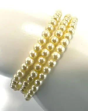 Triple strand faux pearl bracelet thumbnail 1