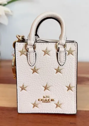 NWT Coach‎ North/South Mini Tote Bag Charm With Star Print thumbnail 1