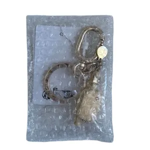 Lululemon Everywhere Belt Bag Key Charm Butter Cream/Gold Key Charm thumbnail 5