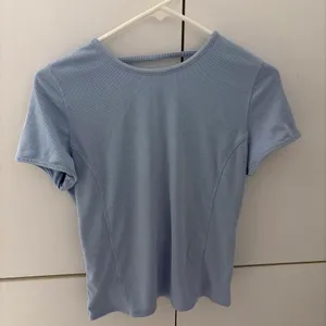 LULULEMON Light blue crop top with open back and tie detail #openback #summer thumbnail 1