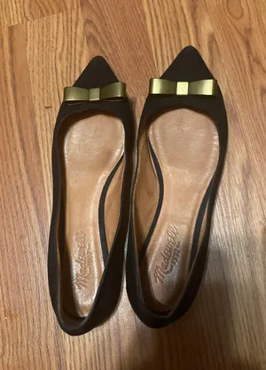 The Bow Tie Skimmer Black Suede Flats size 7 *. Metal gold bows at toes.. Pointy toe flats. ▪️Size 7 ▪️0.25” heel ▪️Excellent used condition: light wear to bottoms and some wear to metal bows thumbnail 1