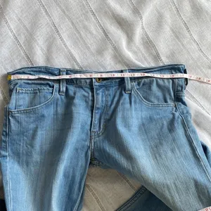 Levi's light wash low flare denim. thumbnail 11