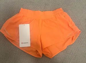Lululemon hotty hot shorts LR 2.5 inch!! Color orange size 4!! thumbnail 3