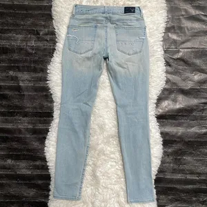 AMERICAN EAGLE LIGHT DENIM DISTRESSED SKINNY JEANS BASIC CASUAL NORMCORE GRUNGE thumbnail 7