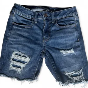 American Eagle Mid‎ Rise Distressed denim shorts with ripped details size 4 thumbnail 1