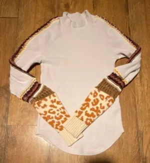Free People Switch It Up Thermal Top Size XS Free People Switch It Up Thermal Top in cream/off-white. Thermal knit fabric with a mock neck and long sleeves. Leopard print cuffs with crochet knit detailing on the sleeves. Pre-owned, no visible wear. thumbnail 1