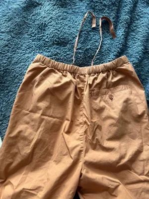 Orange wide leg Uniqlo pants thumbnail 3