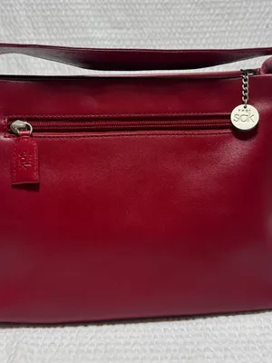 The Sak red leather shoulder bag zip closure, detachable strap interior pockets thumbnail 1
