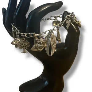 Silver tone charm bracelet with assorted charms thumbnail 2