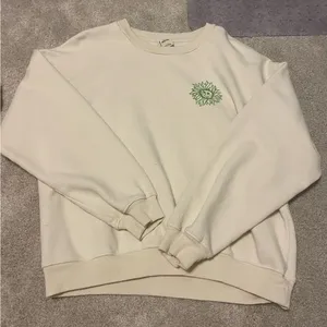 Urban Outfitters Follow The Sun Puff Paint Graphic Sweatshirt L thumbnail 1