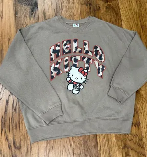 Sanrio Hello Kitty NWOT Leopard animal print sweatshirt size L thumbnail 1