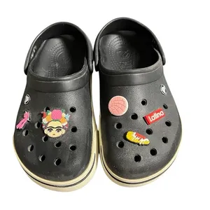 Women’s Black & White Classic Crocs thumbnail 2