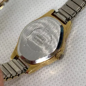 Women gold silver tone watch 20mm round case quartz analog stretch 6.5” running thumbnail 6