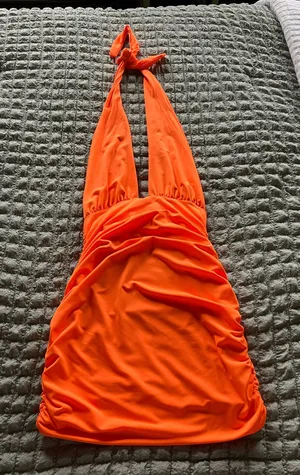 SheIn Orange ruched mini dress with halter neck and tie back. Size: S #party #clubwear #summerdress thumbnail 1