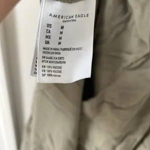 American Eagle olive green wide leg pants in size Medium thumbnail 5