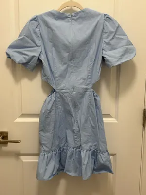This WAYF puff sleeve wayf dress features a light blue color and side cutouts. thumbnail 6