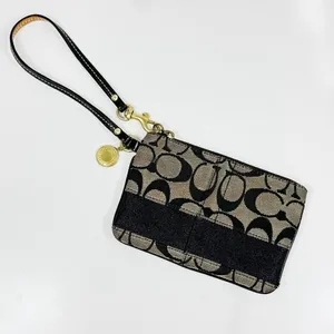 Coach 40028‎ Signature Logo Jacquard Corner Zip Wristlet Pouch Tan Black thumbnail 1