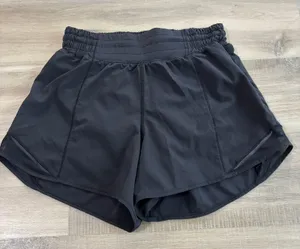 Lululemon Hotty Hot Short High-Rise Long 4" Women Size 4 Black thumbnail 1