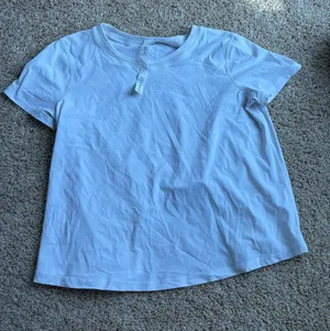 Lululemon Short Sleeve Cropped Shirt thumbnail 1