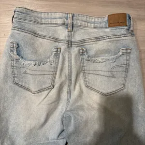 American eagle AE stretch mom jeans light wash blue ripped distressed size 4R thumbnail 6