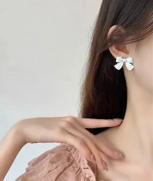 Coquette Cream White Bow Earrings thumbnail 1