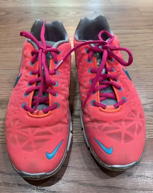 Nike Coral Pink and Orange Women's Running Shoes with Blue Swoosh thumbnail 1